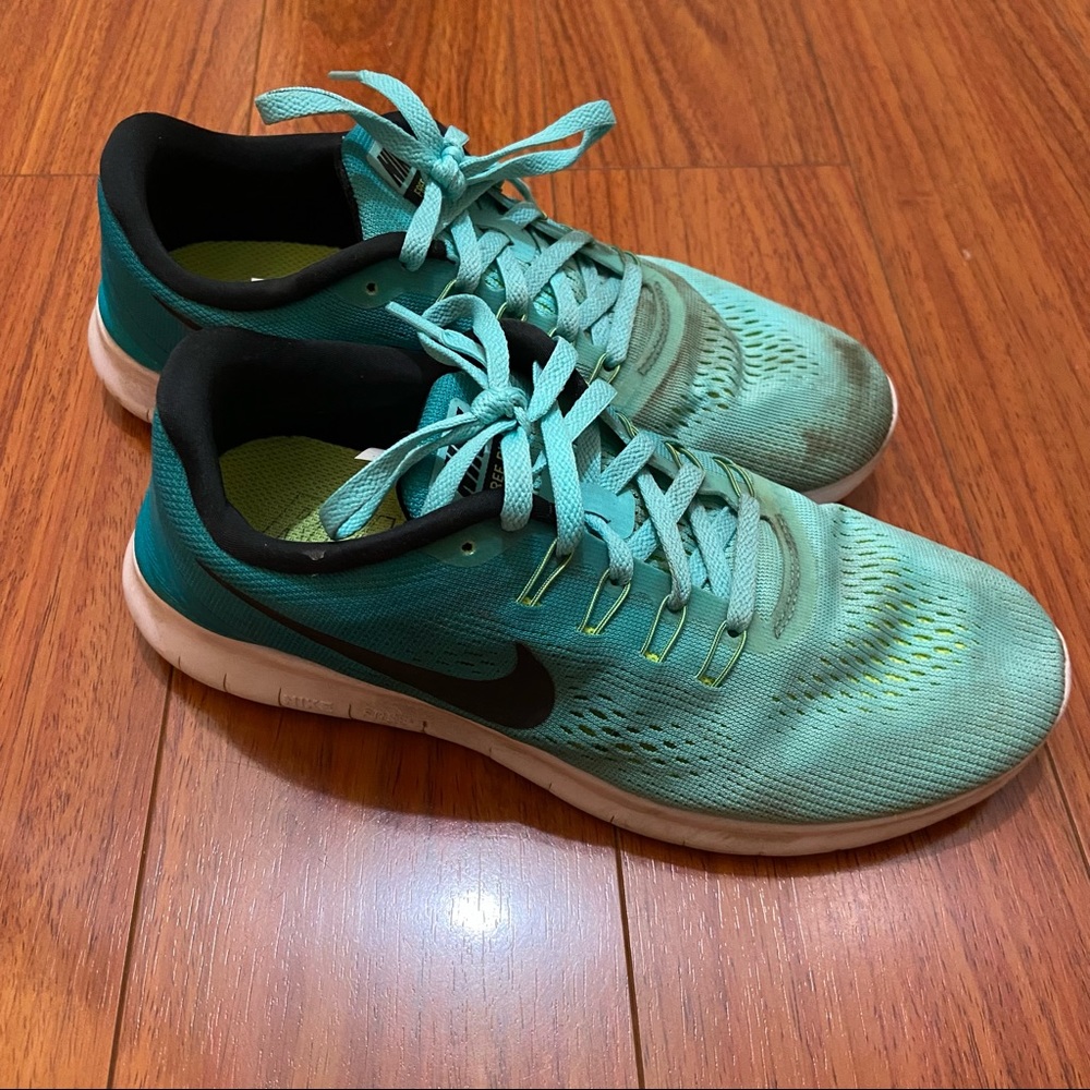 Nike teal free run